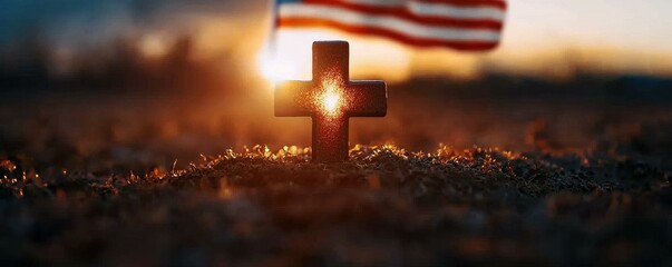 Remembering Sacrifice Cross with American Flag Backdrop