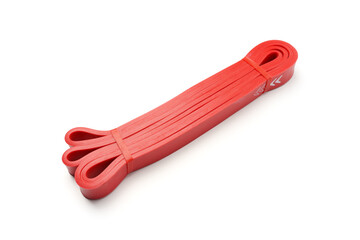 fitness elastic band. Woman showing a blue rubber band. Sport and healthy active lifestyle concept. A set of colorful elastic fitness band.	
