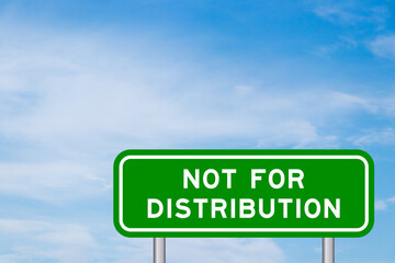 Green color transportation sign with word not for distributionon blue sky with white cloud background