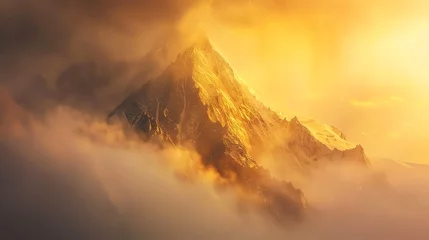 Gordijnen A majestic mountain peak is bathed in warm golden light. © Galib