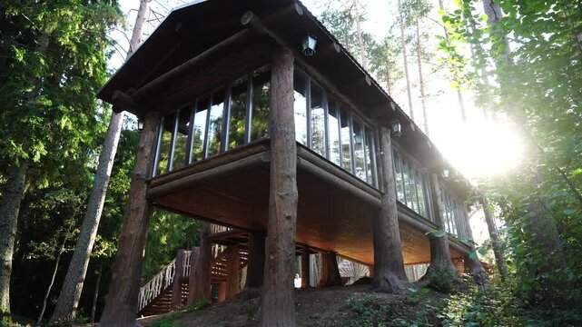 Russia-style wooden cabin house in the woods 