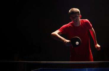 Teenager play  table tennis in on white background