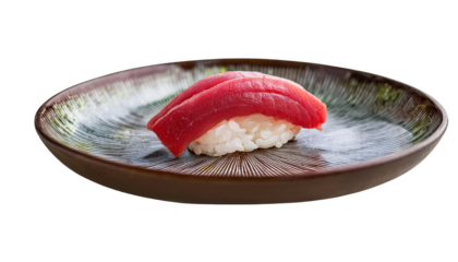 Sushi roll with fresh tuna on a decorative plate, white isolated background.