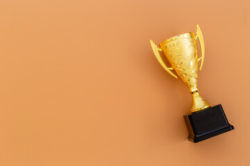 Award golden trophy cup, top view. First place winning the competition concept