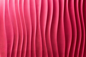 Fototapeta premium Abstract curve of pink wavy vertical lines, background. Fashionable pink stripes texture design. A collection of luxurious soft layers of striped background.
