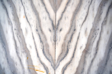 Texture of a natural marble tile wall showcasing natural patterns and textures. Background for text or copy space and empty space for advertising