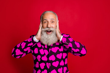 Close-up portrait of his he nice attractive cheerful cheery funky overjoyed bearded gray-haired man great news season sale isolated over bright vivid shine vibrant red color background