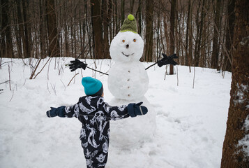 little boy in winter park