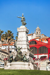 Obraz premium Porto, Portugal - December 28, 2024: Jardim do Infante Dom Henrique, garden named after Prince Henry the Navigator depicted in the elevated statue