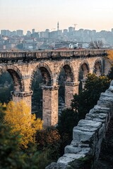 Fototapeta premium the stone aqueduct in Istanbul, highlighting the contrast between the ancient stone structure