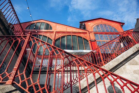 Porto, Portugal - December 28, 2024: Mercado Ferreira Borges, an iconic market building built in the 1880s of iron and glass, now hosting a nightclub and restaurant.