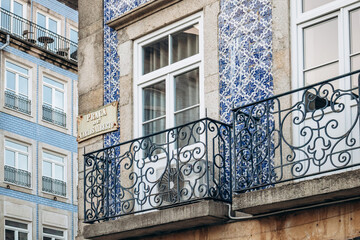 Close-up of a facade in Porto covered with traditional ceramic tiles (azulejos)