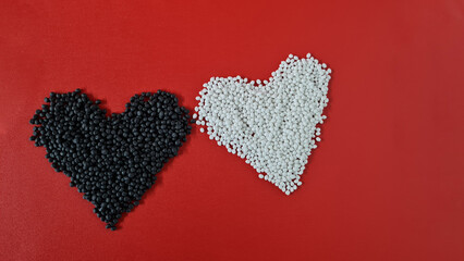 Me and you - white and black hearts on red background