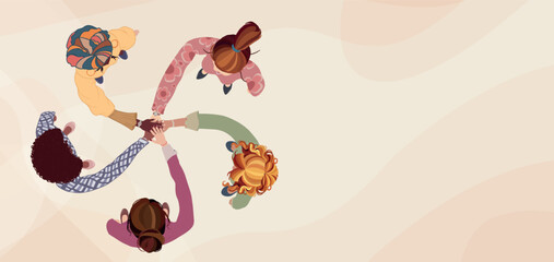 Top view of a diverse group of female colleagues in a circle hands stacked together as a symbol of agreement or unity.International women s day.DEIB or empowerment.Banner copy space