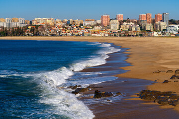 Big waves on Cabedelo do Douro beach in Vila Nova de Gaia, Porto, Portugal
