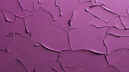A rich aubergine colored stucco background with soft tonal variations