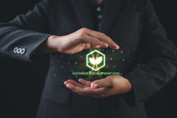 strategic planning and sustainability practices reduce greenhouse gas emissions in industrial work, with a businessman’s hands interacting with a virtual screen highlighting eco-friendly management