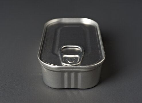 Close up of a Metal Food Can with Pull Tab on Gray Surface