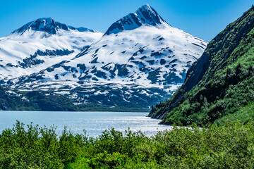 Alaska wilderness with snowcapped mountains, rivers and lakes