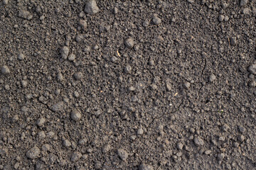 Rocky soil.  rocky stone terrain. Texture of stone . Sandy and rocky soil texture.