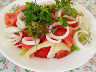 photo of a plate with juicy vegetable salad