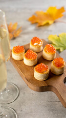 Puff pastry vol-au-vent with red caviar and champagne