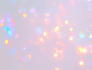 Soft pastel bokeh hexagon shaped lights with blurred iridescent and rainbow hues, sparkly, grain overlay on transparent background
