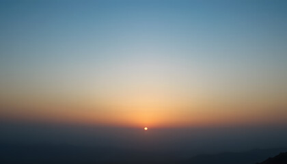 Fototapeta premium Sunset over distant hills