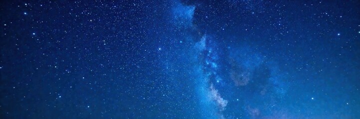 Naklejka premium Celestial canvas of twinkling stars against a deep blue night sky, universe, galaxy, celestial