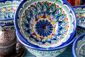Asian tableware with national ornament. Hand-painted by Asian artisans.