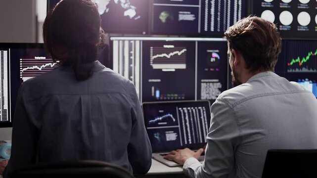 Financial business traders team working analyzing statistics and driving trade on stock exchange.