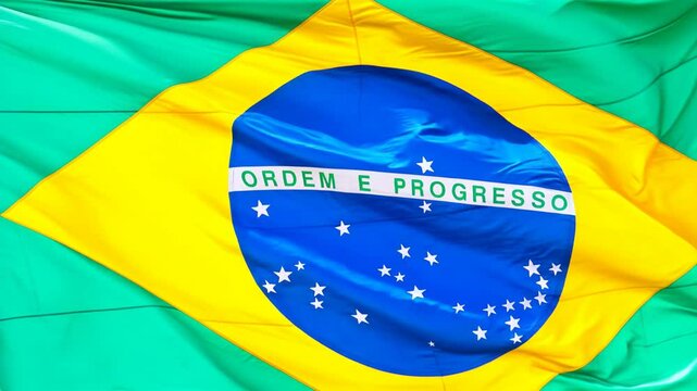 Close up of Brazilian flag in the wind in slow motion. Generative AI.
