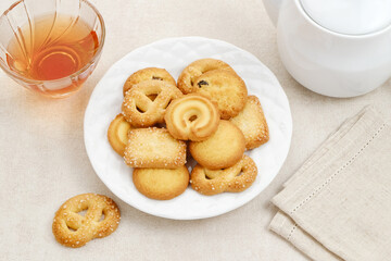 Assorted of danish butter cookies, served on a white plate.
