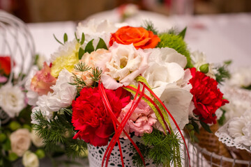  Colorful bouquet of flowers in a vase on the table