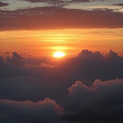 Obraz premium The Dawn of New Beginnings: A Sunrise Illuminating the Clouds