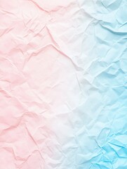Obraz premium Crumpled paper with smooth color transition from pink to white to blue, creating a soft gradient.