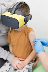Caucasian boy in vr glasses clinic