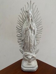 Statue of white Virgin of Guadalupe