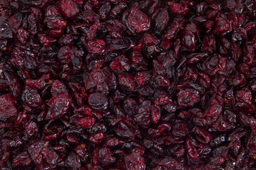 Dried cranberries as a background. Close-up shot. Top view.