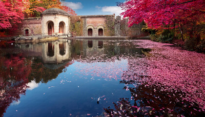 autumn spa history with pink leaves on water