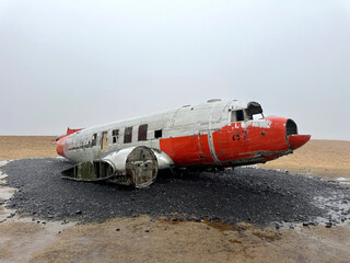 Reykjavik, Iceland: Plane wreck Douglas DC-3 in Solheimasandur, Iceland on black sand beach
