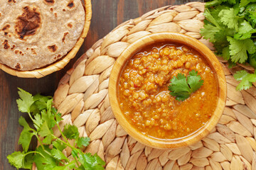 Indian dal food (Masoor Dal or Dal Tadka Curry) and homemade Flatbread Chapati. Traditional Indian...
