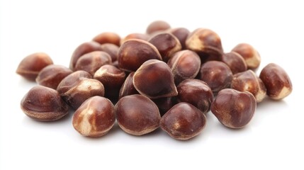 Obraz premium Brown seeds pile, food ingredient, white background, healthy eating
