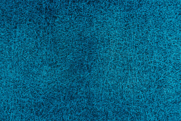 Texture of dense blue fabric for tailoring. Canvas. Textile. Material. Velour