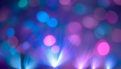 Defocused neon blue purple pink light. Overlaying highlights. Colorful bokeh. Futuristic LED illumination. Blur of colors on the dark abstract background.