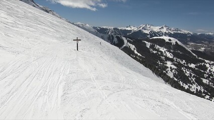 Active Person Enjoying Winter Sports By Skiing Down A Snow-covered Hill