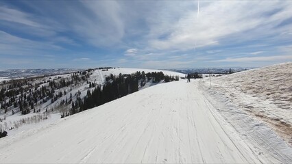 Beautiful View Of A Snow-covered Mountain Underneath A Clear Blue Sky