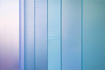 Close-up of frosted glass in icy blue, subtle gradients and soft, diffused light creating an elegant effect.