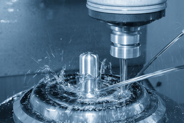 The CNC milling machine cutting the shell mold parts with oil coolant method.