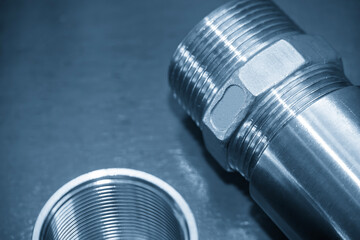 Close up scene the stainless steel 304 pipe connector in the light blue scene